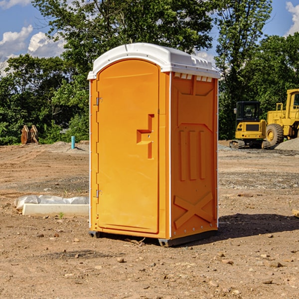 how often are the porta potties cleaned and serviced during a rental period in McConnell